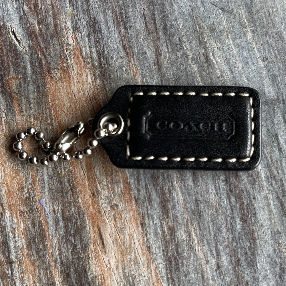 Coach black leather hang tag